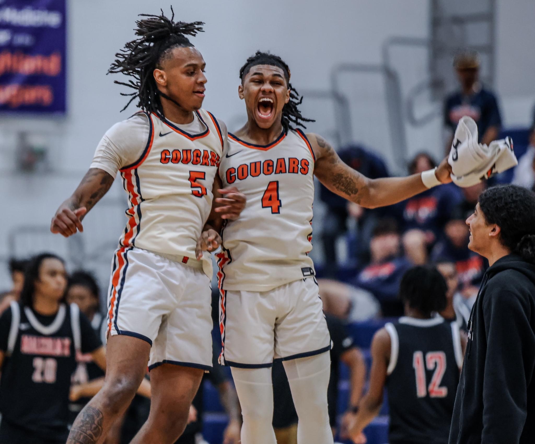 Basketball players celebrating during a game